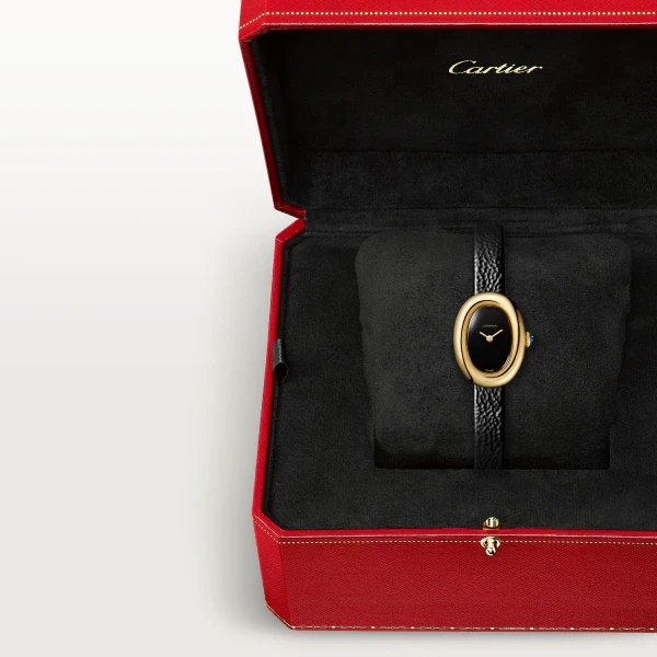 Baignoire de Cartier watch, mini model, quartz movement. Case in 750/1000 yellow gold. Beaded crown in 750/1000 yellow gold set with a sapphire cabochon